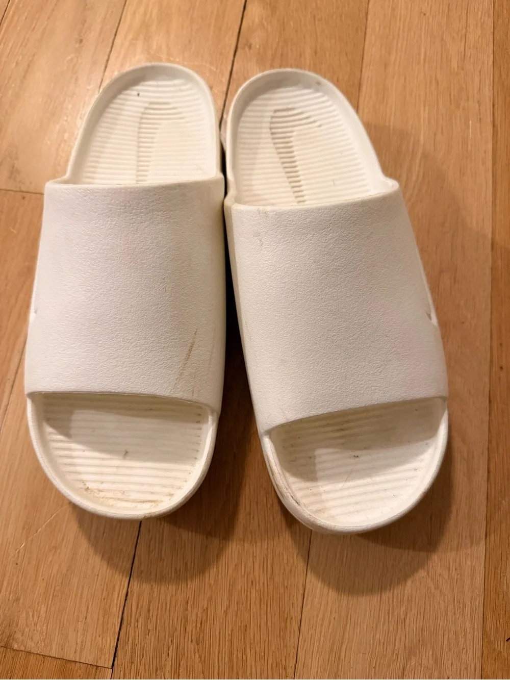 Nike White Mens Slide size 11 (or Women’s 12) Embossed Swoosh